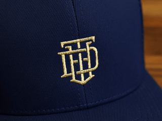 THE HONEST WATCH DEALER 6 PANEL MESH CAP IN NAVY BLUE