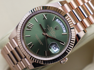 ROLEX DAY-DATE 40mm 18ct ROSE GOLD 228235 OLIVE GREEN ROMAN NUMERAL DIAL WARRANTY 2024 UK B&P