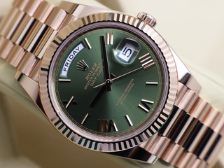 ROLEX DAY-DATE 40mm 18ct ROSE GOLD 228235 OLIVE GREEN ROMAN NUMERAL DIAL WARRANTY 2024 UK B&P