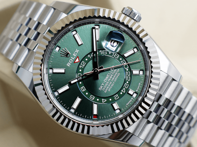Rolex Sky-Dweller stainless steel 42mm watch with a mint green dial and 18ct white gold fluted bezel